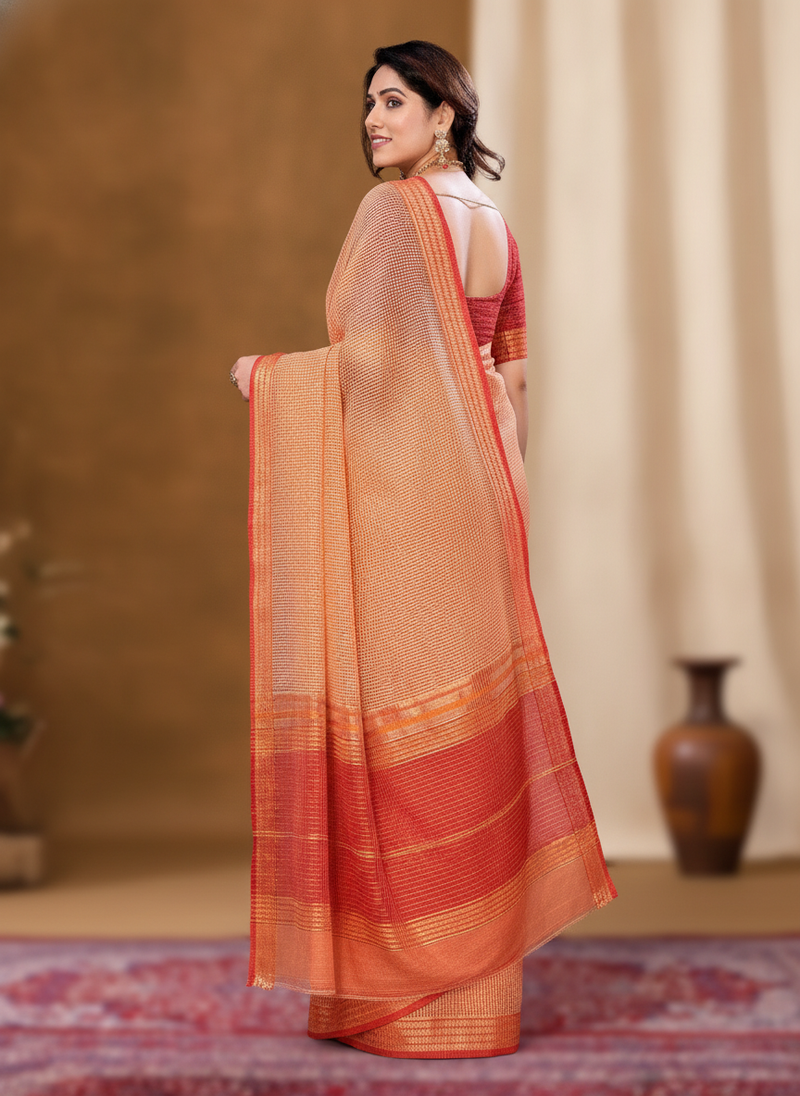 Diverse model in a peach Kota Doria Cotton Checks Saree with a jacquard border, showcasing the lungi pattern and stripe blous